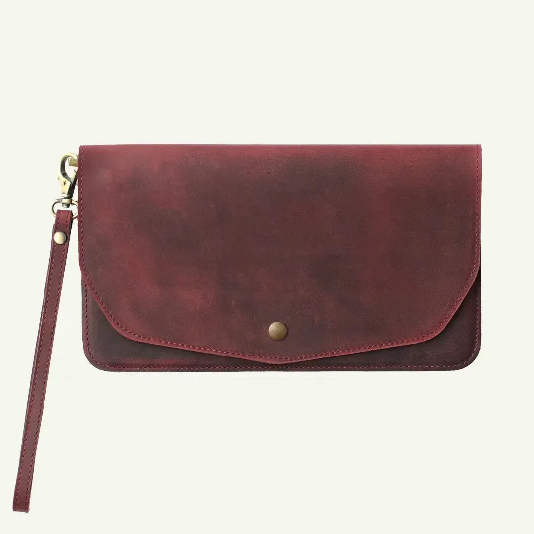 Purple leather clutch bag by Mayacraft